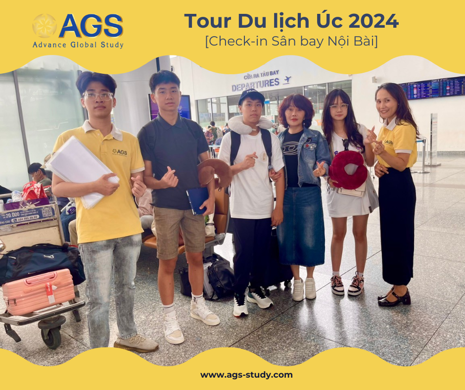 A group of travelers posing at Noi Bai Airport for the AGS Australia Tour 2024.