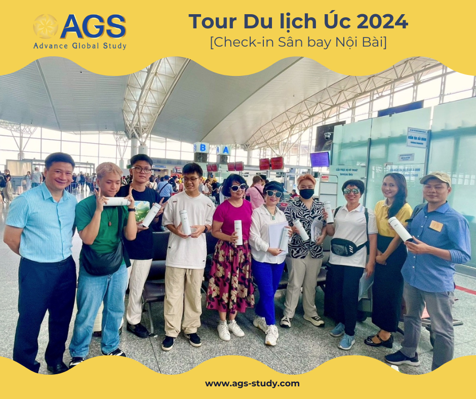 AGS tour group posing for a photo at Noi Bai Airport before departing for Australia.